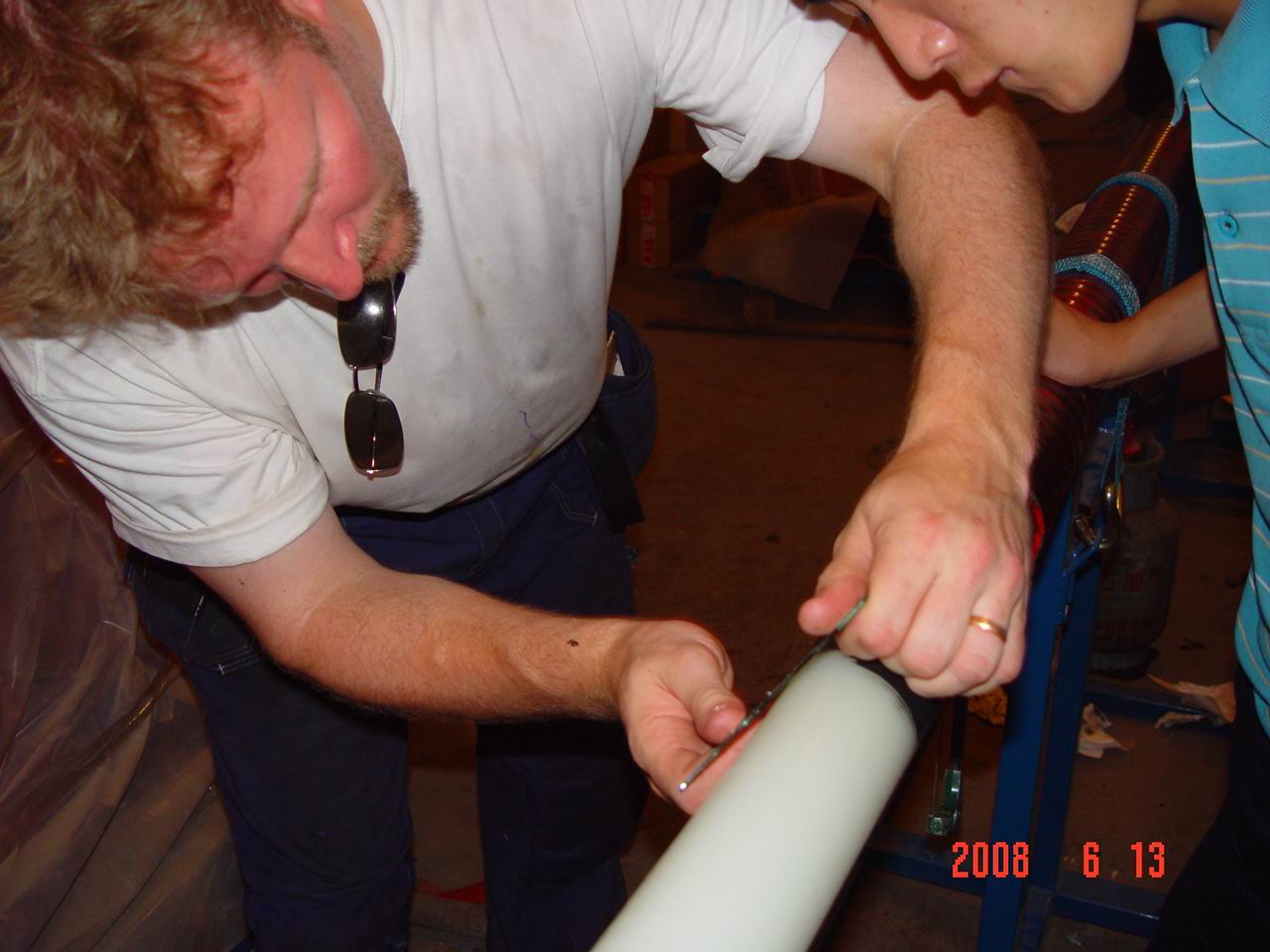 The trainer shows us how to use the glass to polish