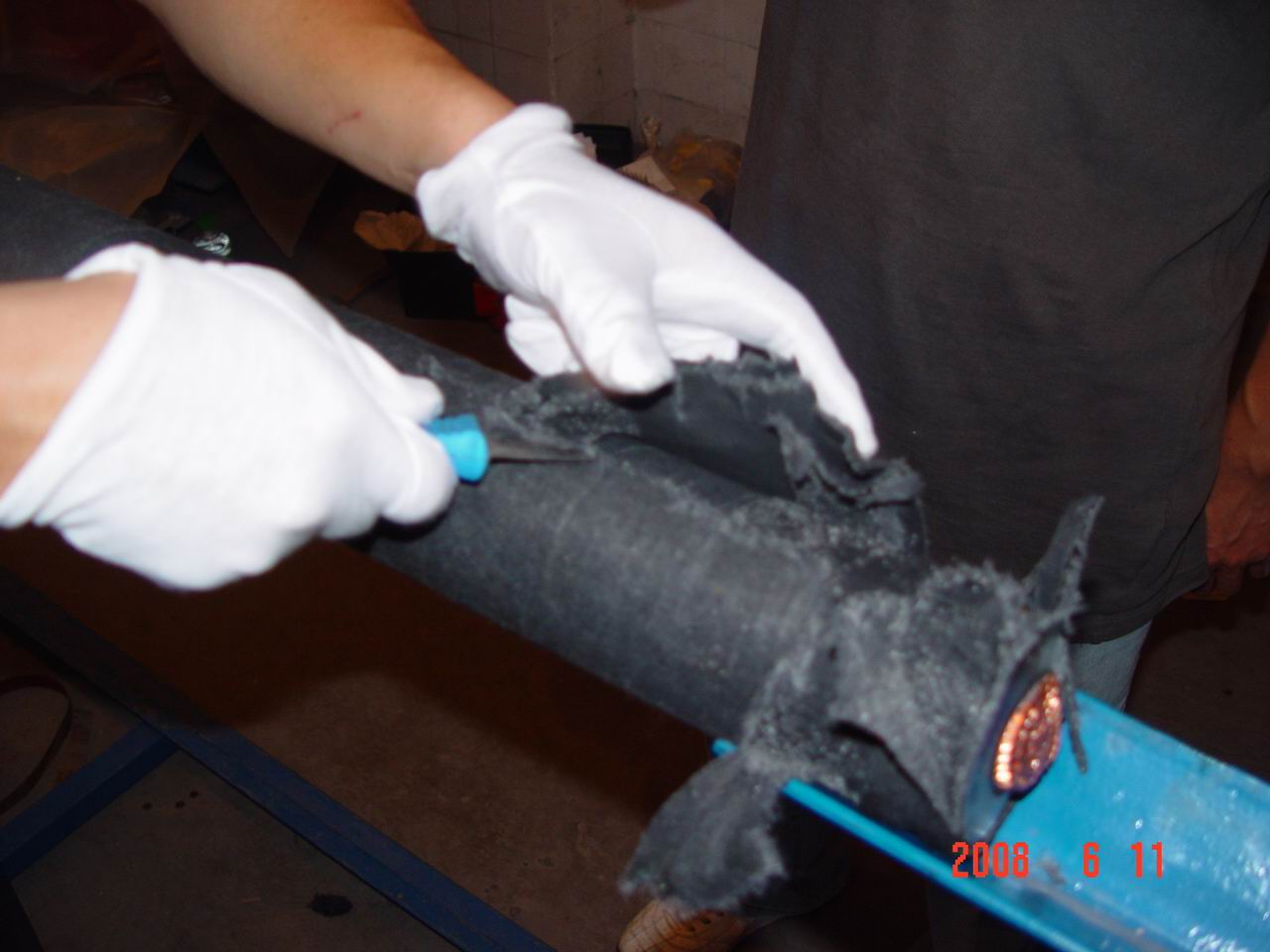 Cutting off the protection layer which is protecting the body of cable